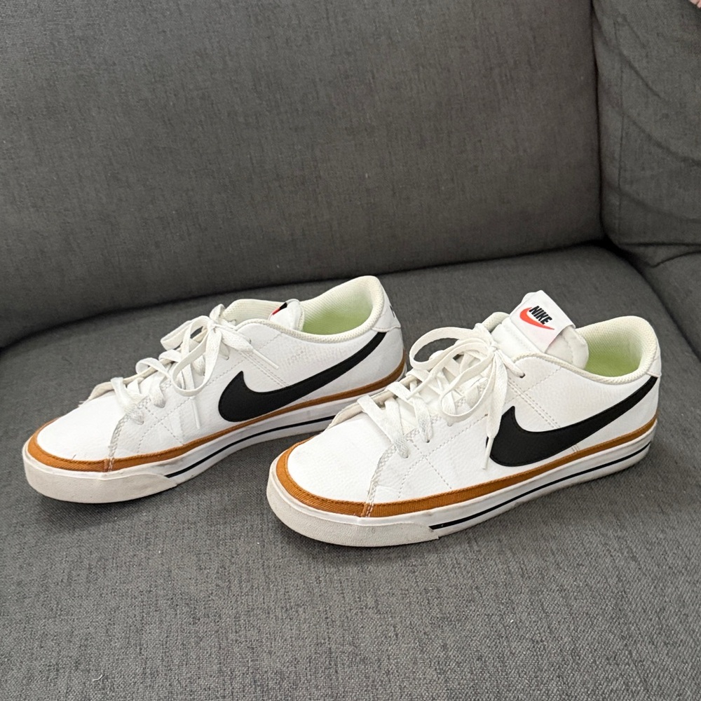 Nike White Low-Top Sneakers with Black Swoosh and Brown Trim 9.5